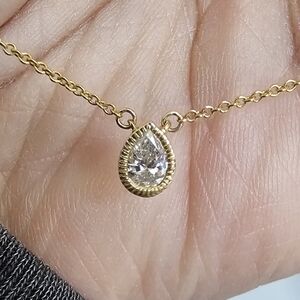 1/5 ct diamond pear cut solitaire necklace in 10k yellow gold